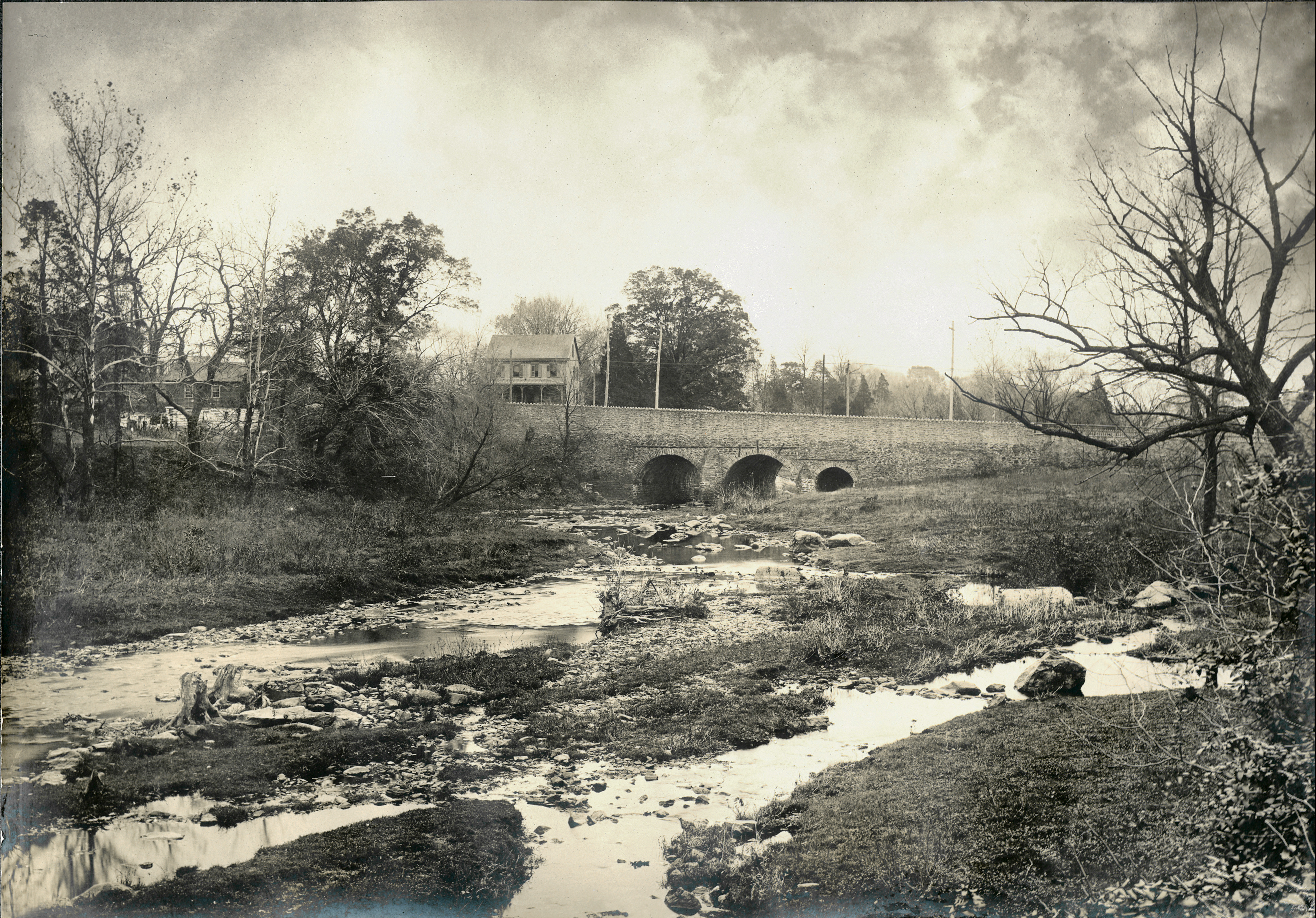 A view of the bridge from upstream, circa 1900, after the bridge was widened.  