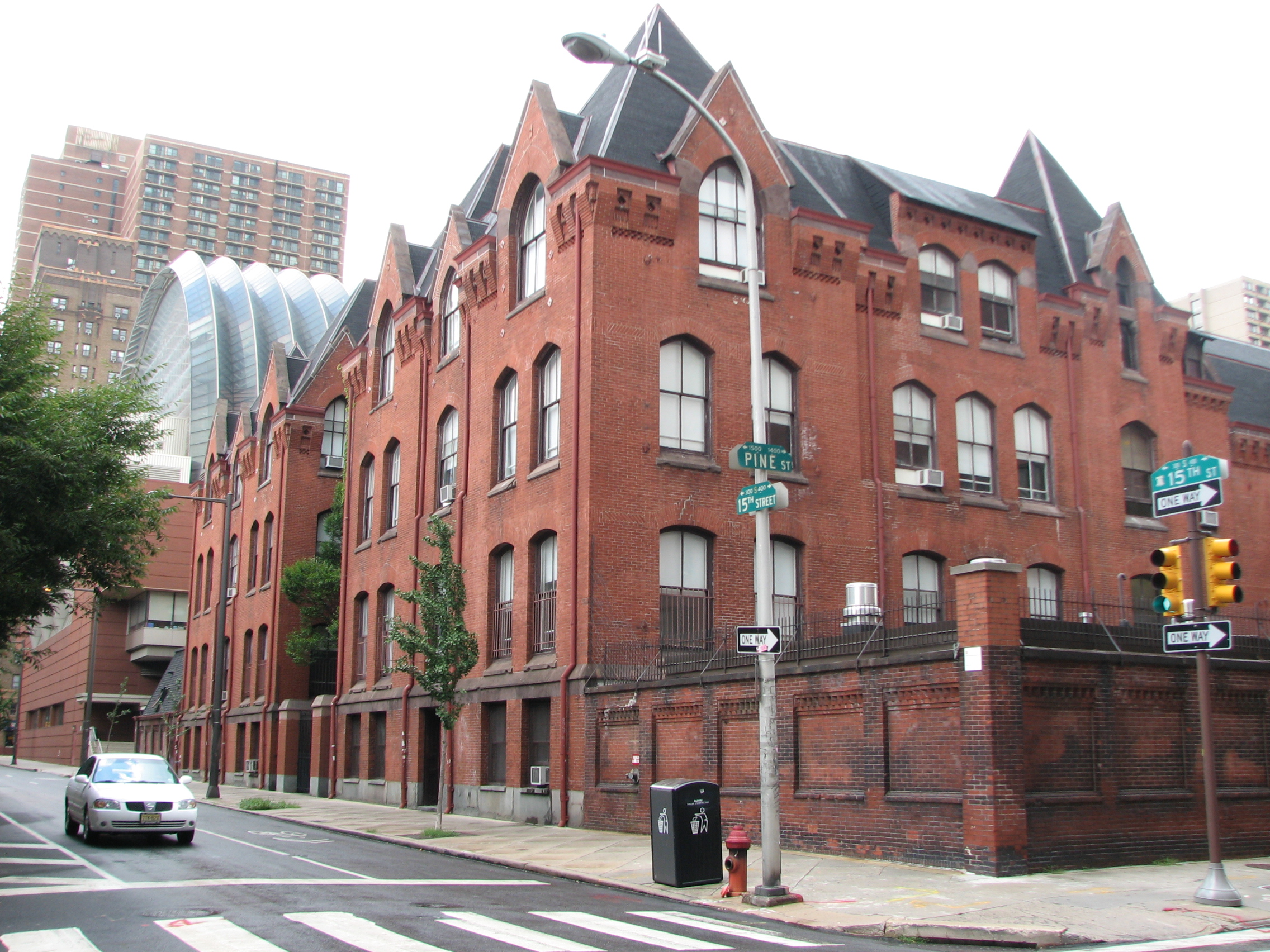 Frank Furness added the Victorian Gothic additions that extended the building to 15th Street.