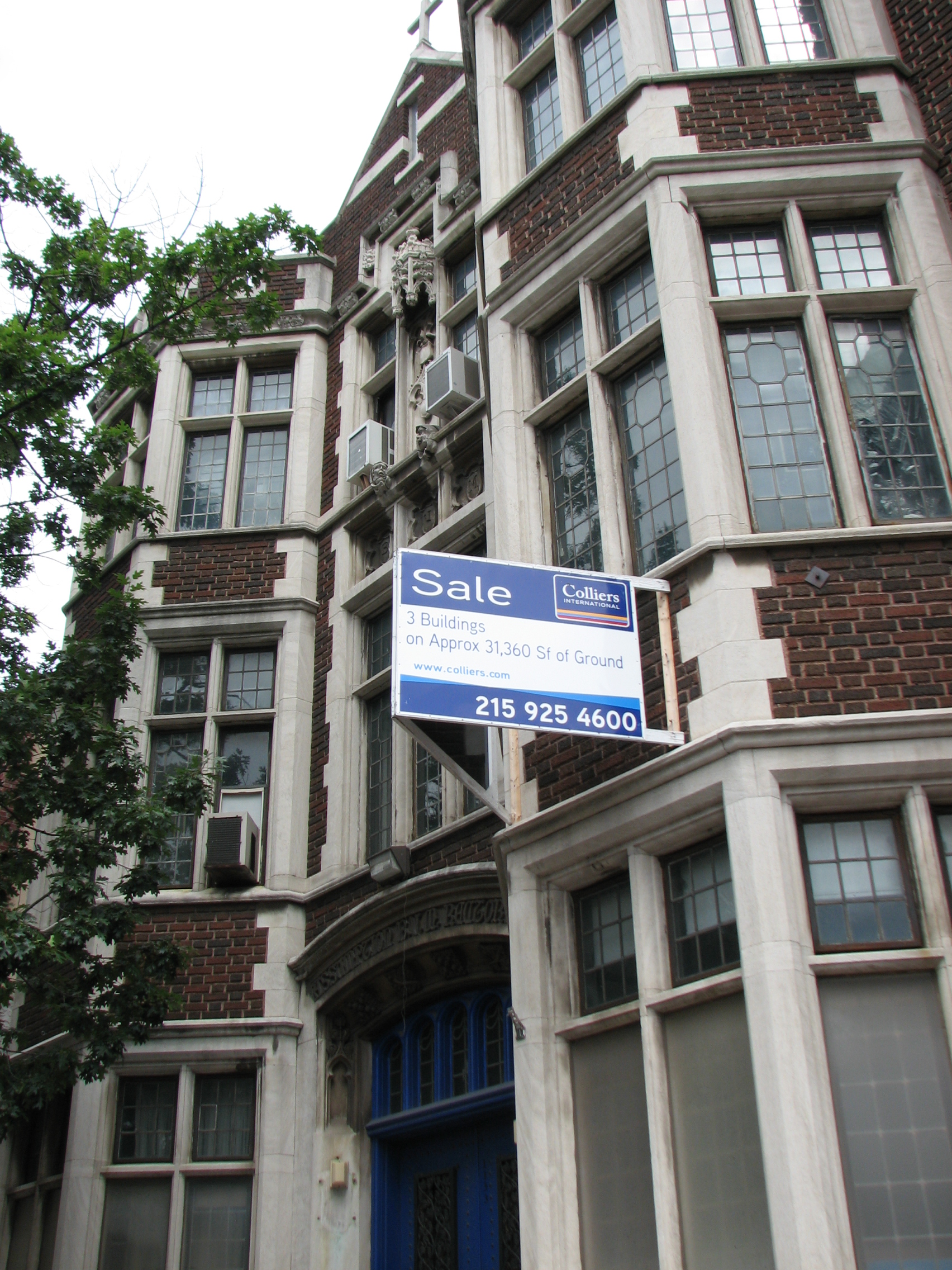 “Sale” signs are still posted on the church and school, two weeks after the property was sold.