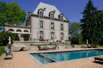 The outdoor pool, pavilion and house as they appeared in a real estate listing in 2011.