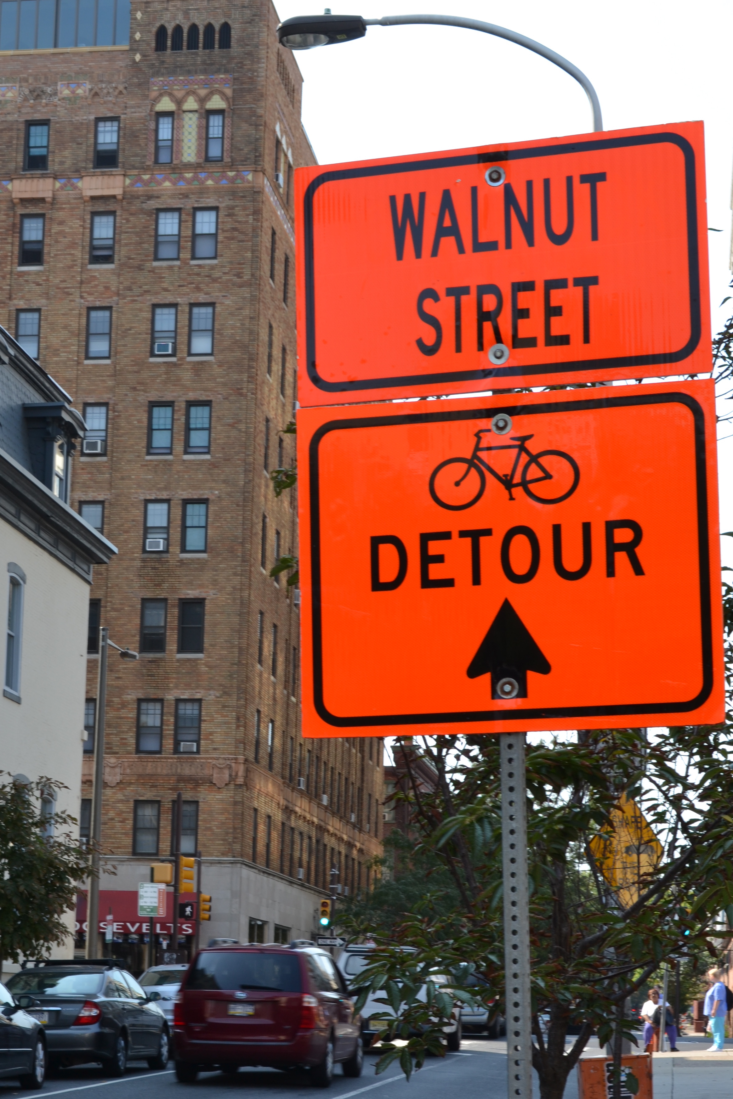During construction detour signs directed bicyclists across the South Street Bridge