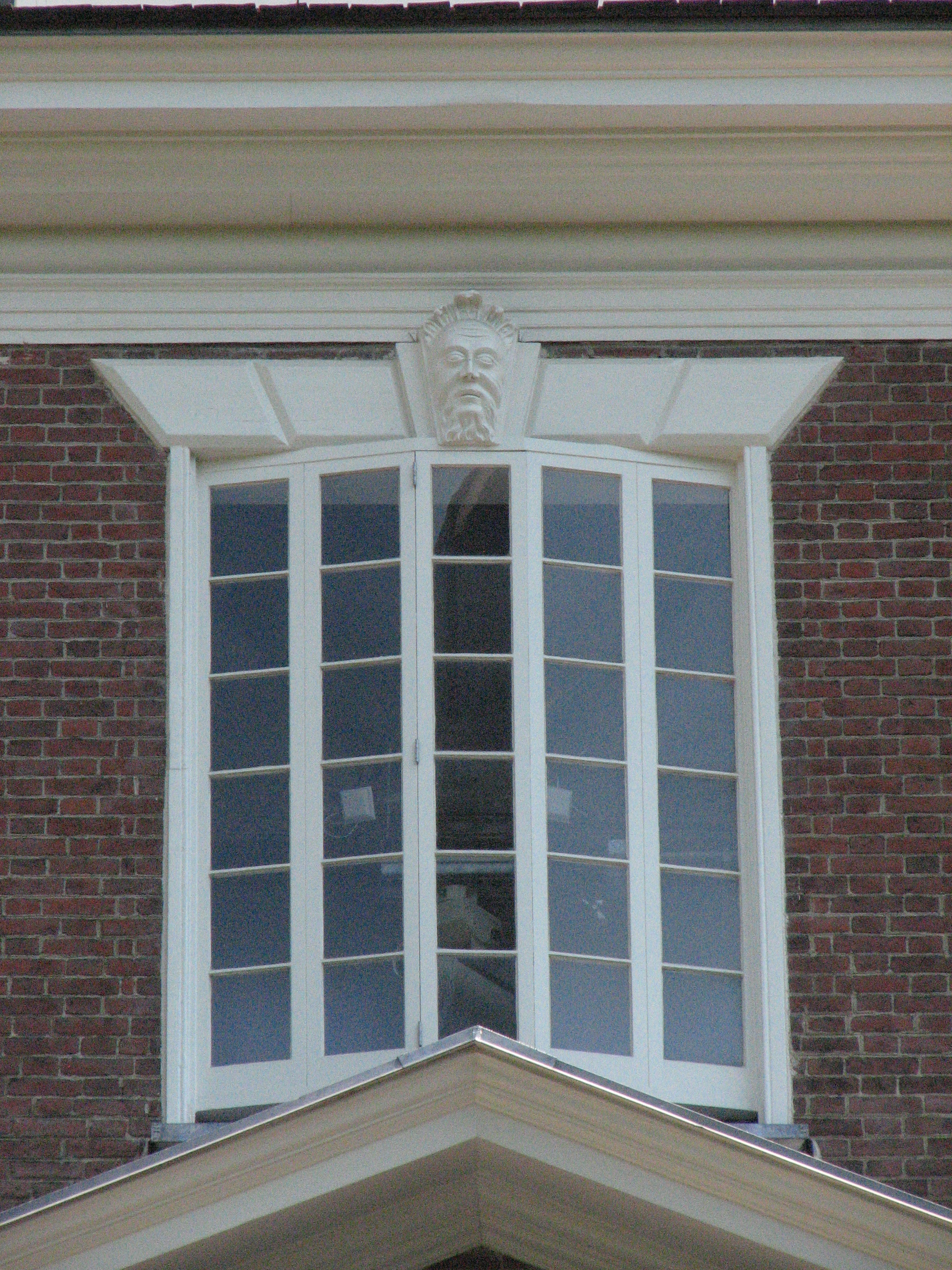 The window on the fourth story of the tower's south side.