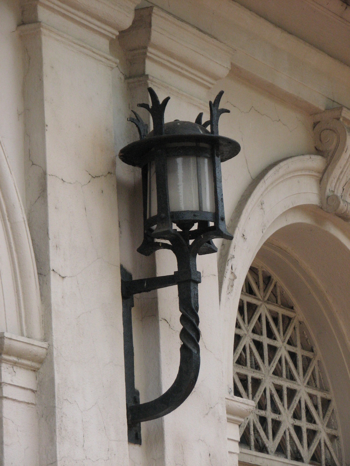 Handsome cast-iron lighting was designed for the exterior and interior of the building.