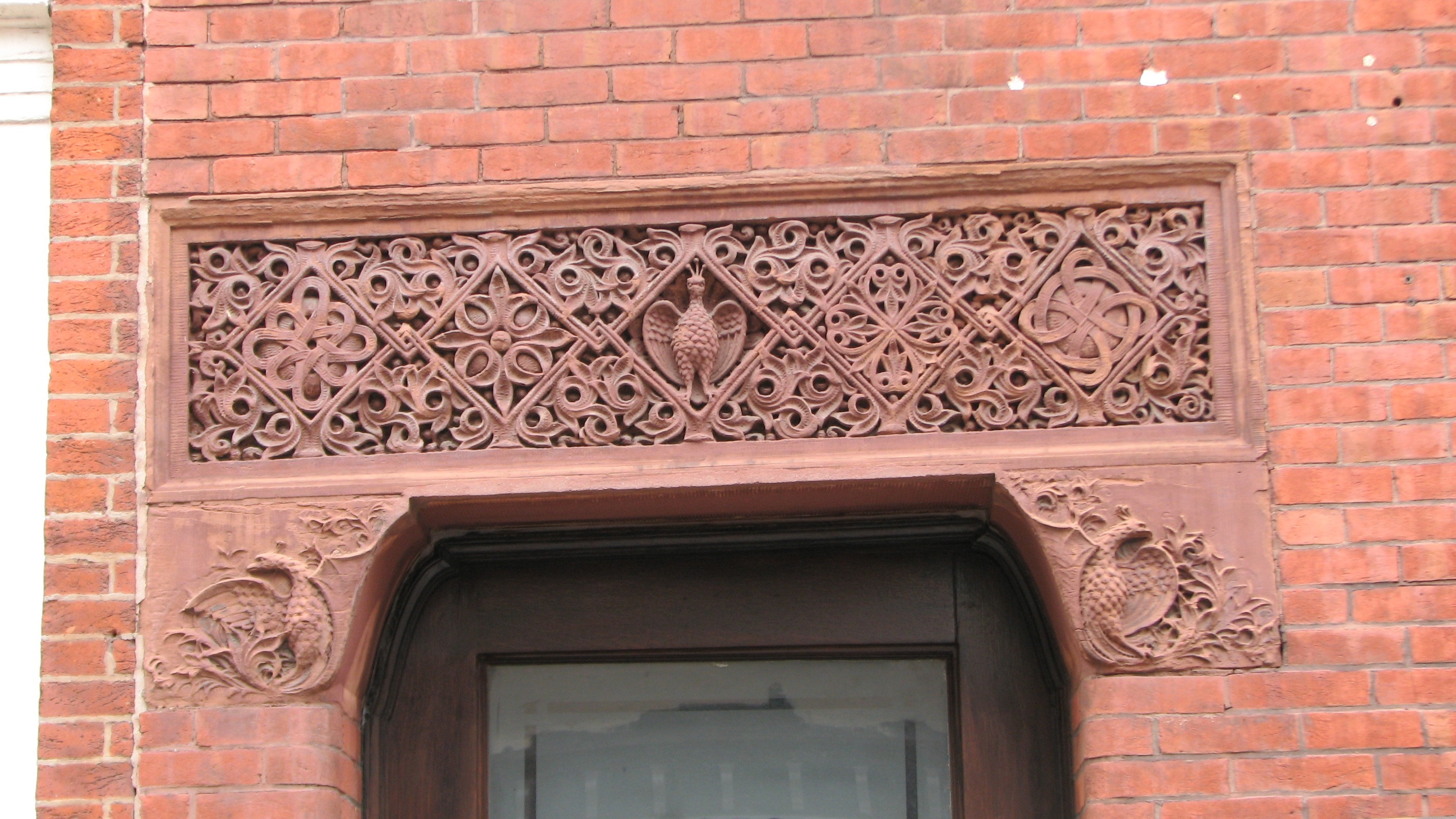 Terra cotta carvings adorn the entrance to the Etting Residence.