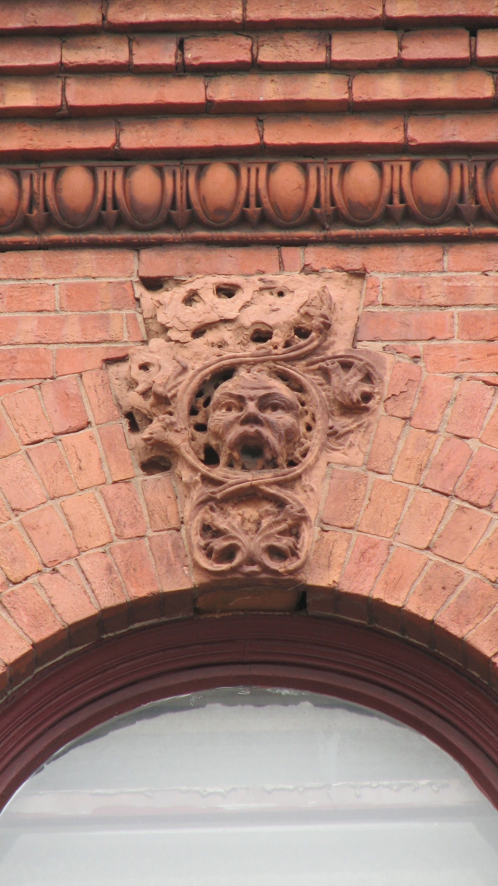 A detail above the third-story window.