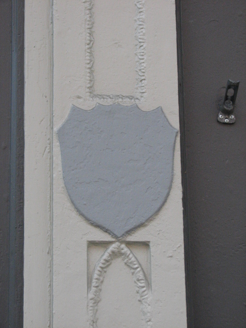 Shields that probably bore the St. Charles name are still found on the first-floor columns.