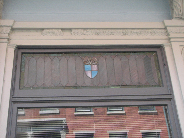 A few of the stained glass panels have survived the building's transitions.