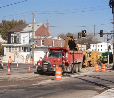 Workers regrade State Road at Princeton Avenue in Tacony. PennDOT photo