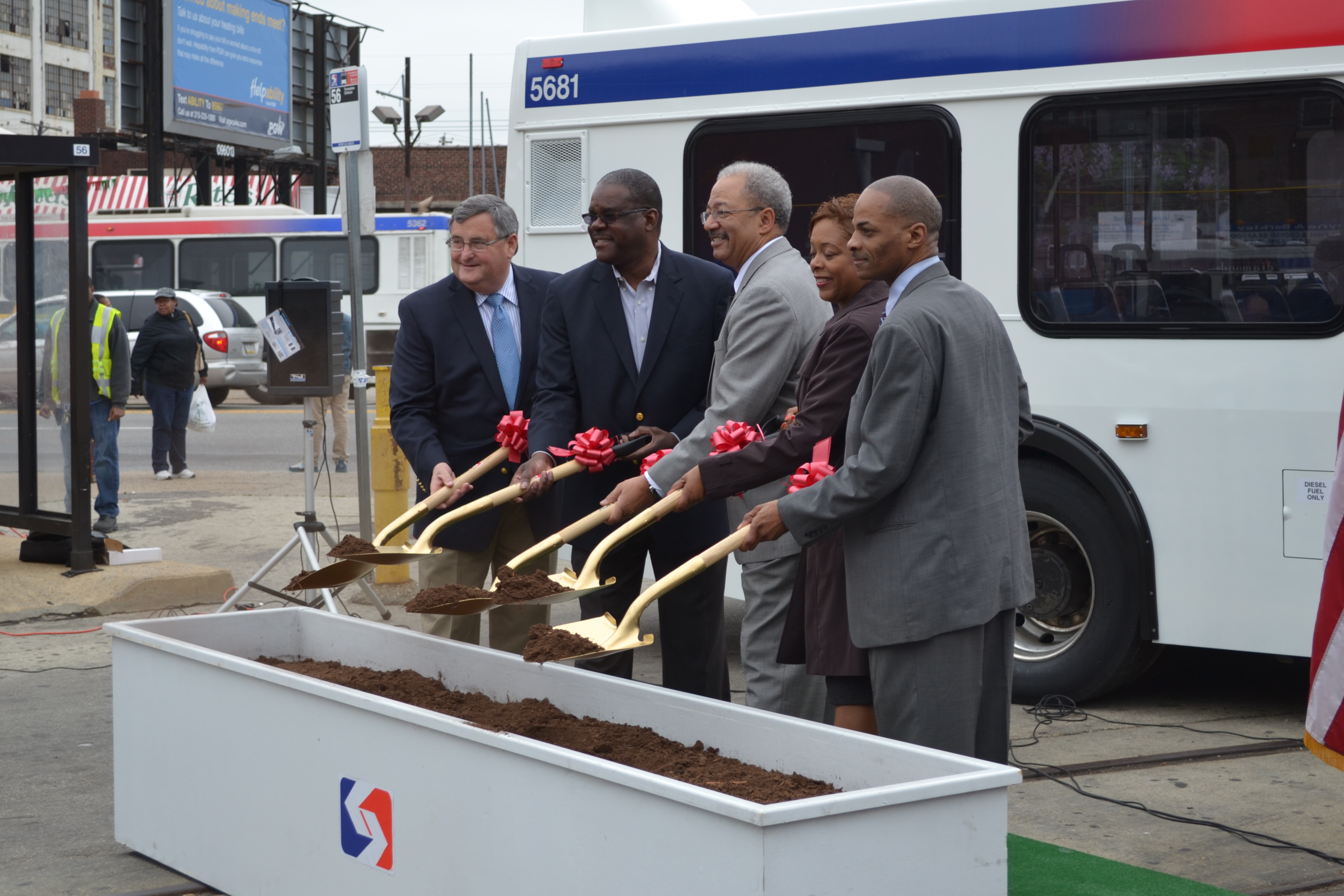 Fattah (middle) posed with SEPTA, neighborhood and city representatives for the ceremonial ground breaking