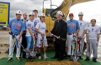 Father Judge athletes join Director of Institutional Advancement Brian Patrick King and President Fr. Joe Campellone for the groundbreaking ceremony at Ramp Playground. Photo by Michelle Alton.