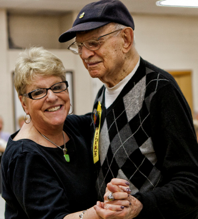Klein JCC Program Director for Adult Services Shelley Geltzer enjoys a slow dance with Dr. Fred Goldman on his 100th birthday. Photo/Michelle Alton
