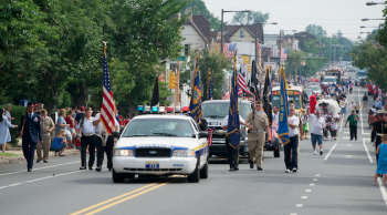 The 2011 Lawncrest Fourth of July parade rolls down Rising Sun Avenue toward the rec center. Photo/Bill Achuff