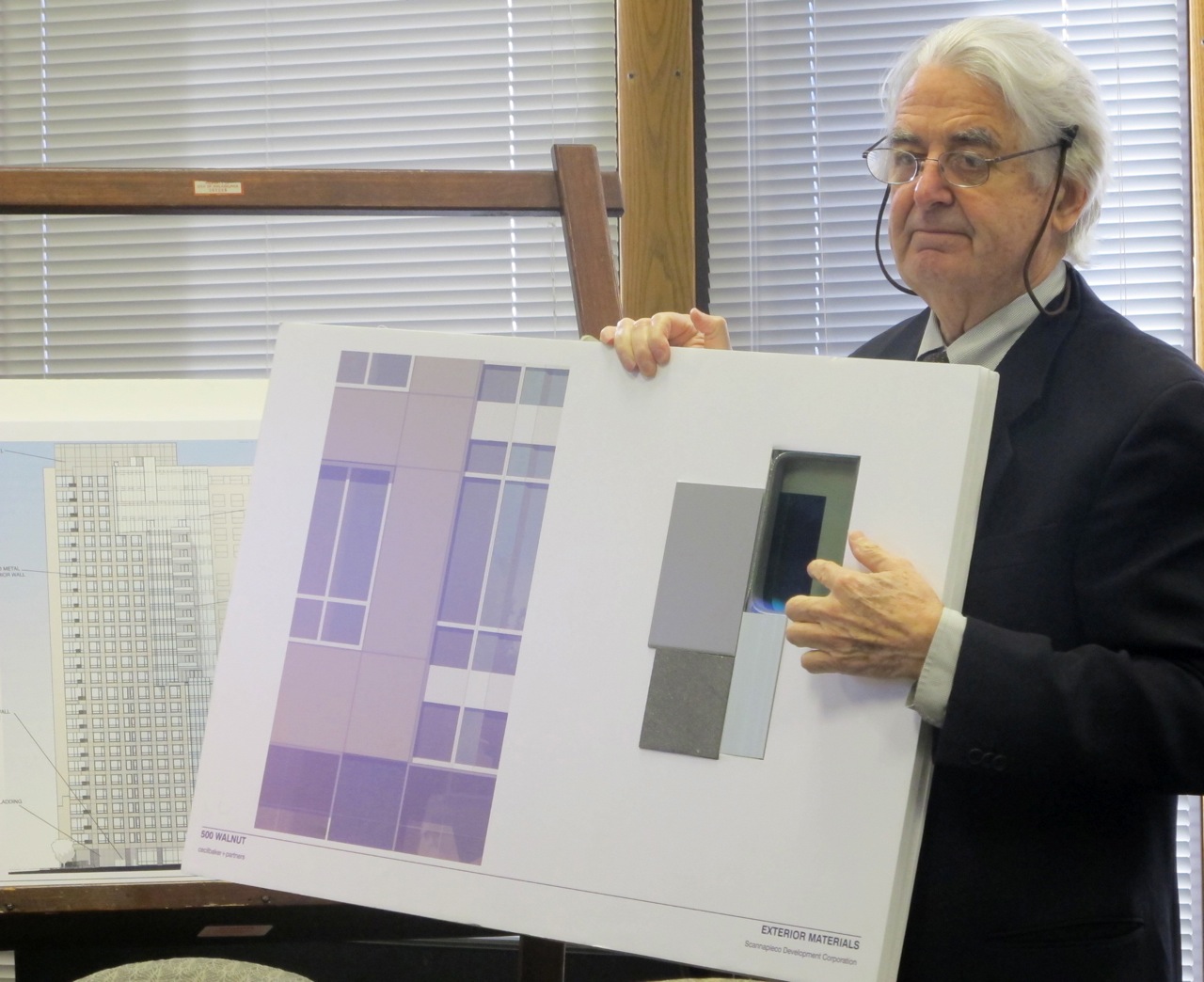 Architect Cecil Baker shows Historical Commission members design details