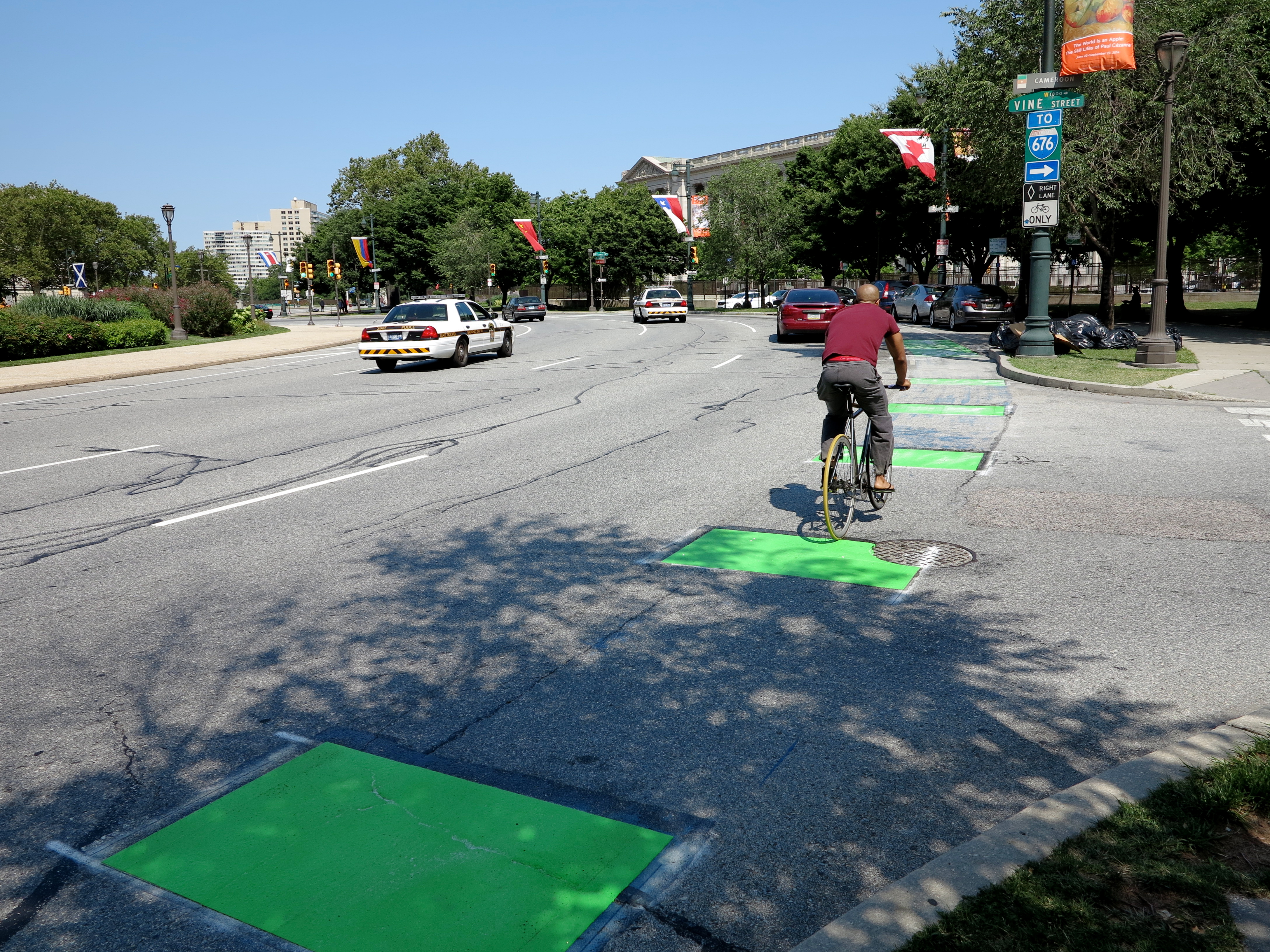 Fresh green paint for a bike/car conflict zone on Logan Circle