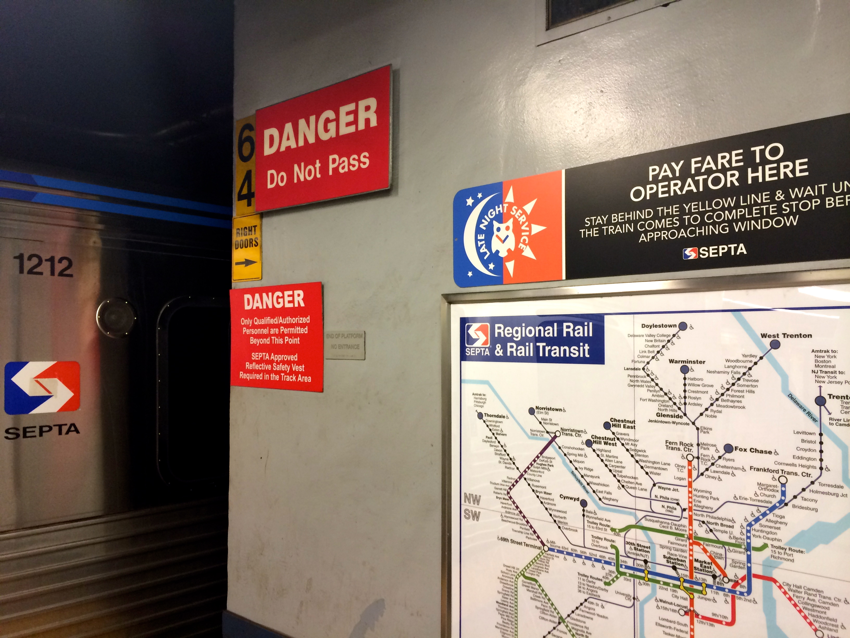 Late night service signage on subway platform