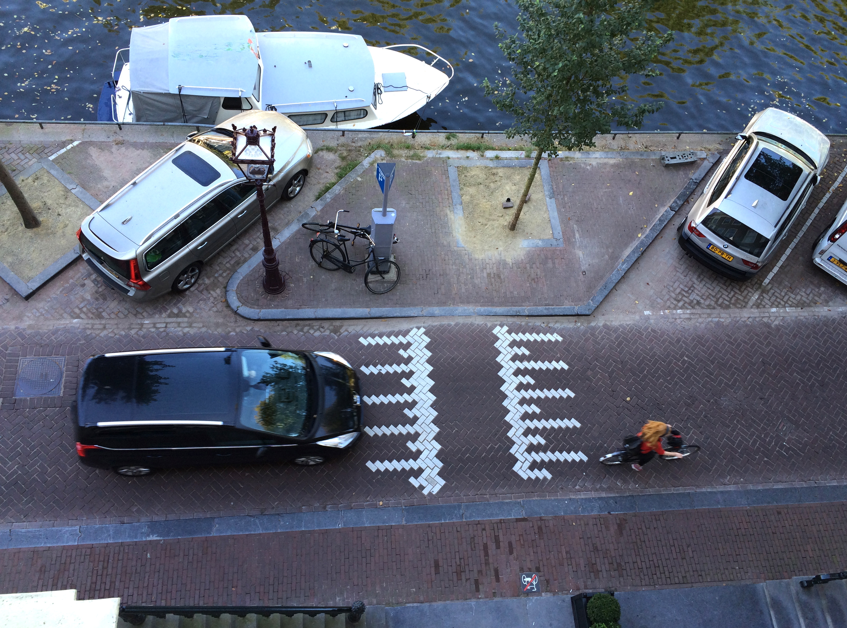 Narrow streets mean shared spaces in Amsterdam's core.