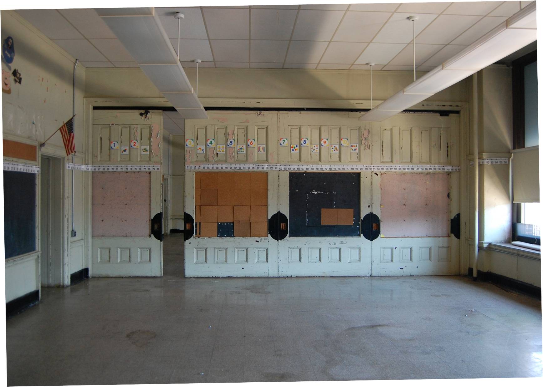 Old Frances Willard School still has classic millwork like these sliding partitions | courtesy of Community Design Collaborative