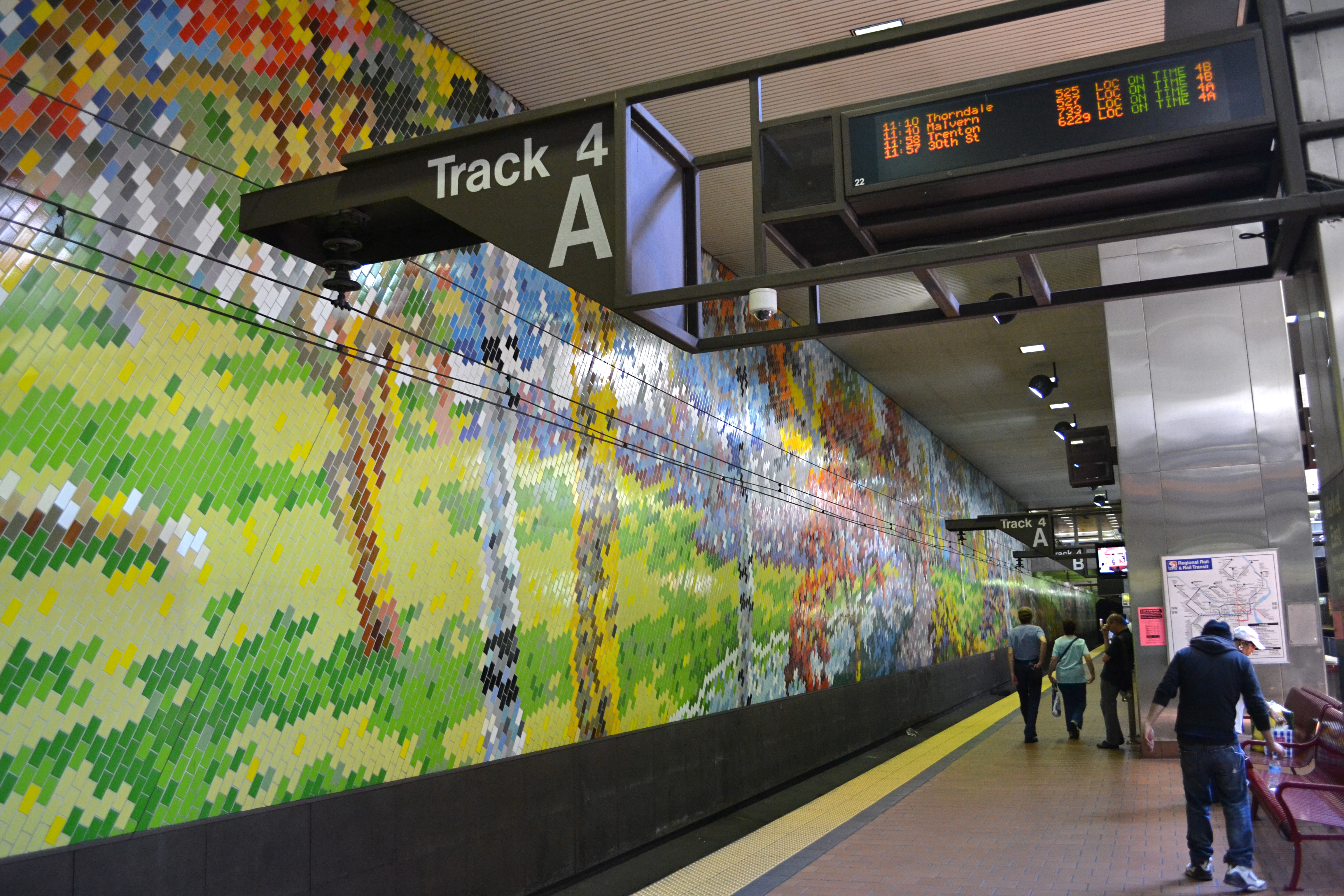 The turnstiles will incorporate each of the station's unique design features, like the colored bricks at Market East Station