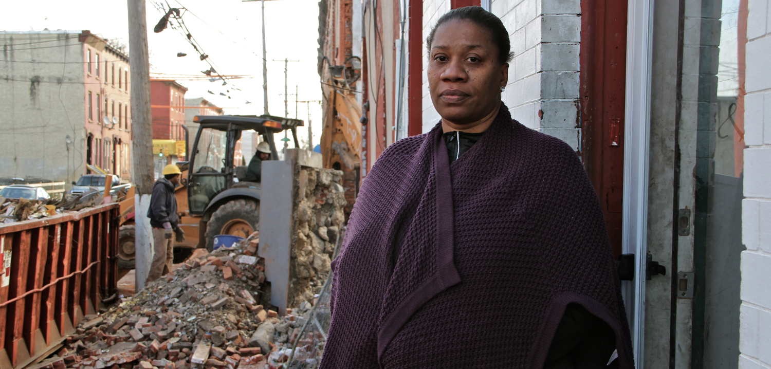 Beatrice Mack, with demolition two doors down. February, 2016 | Emma Lee/WHYY