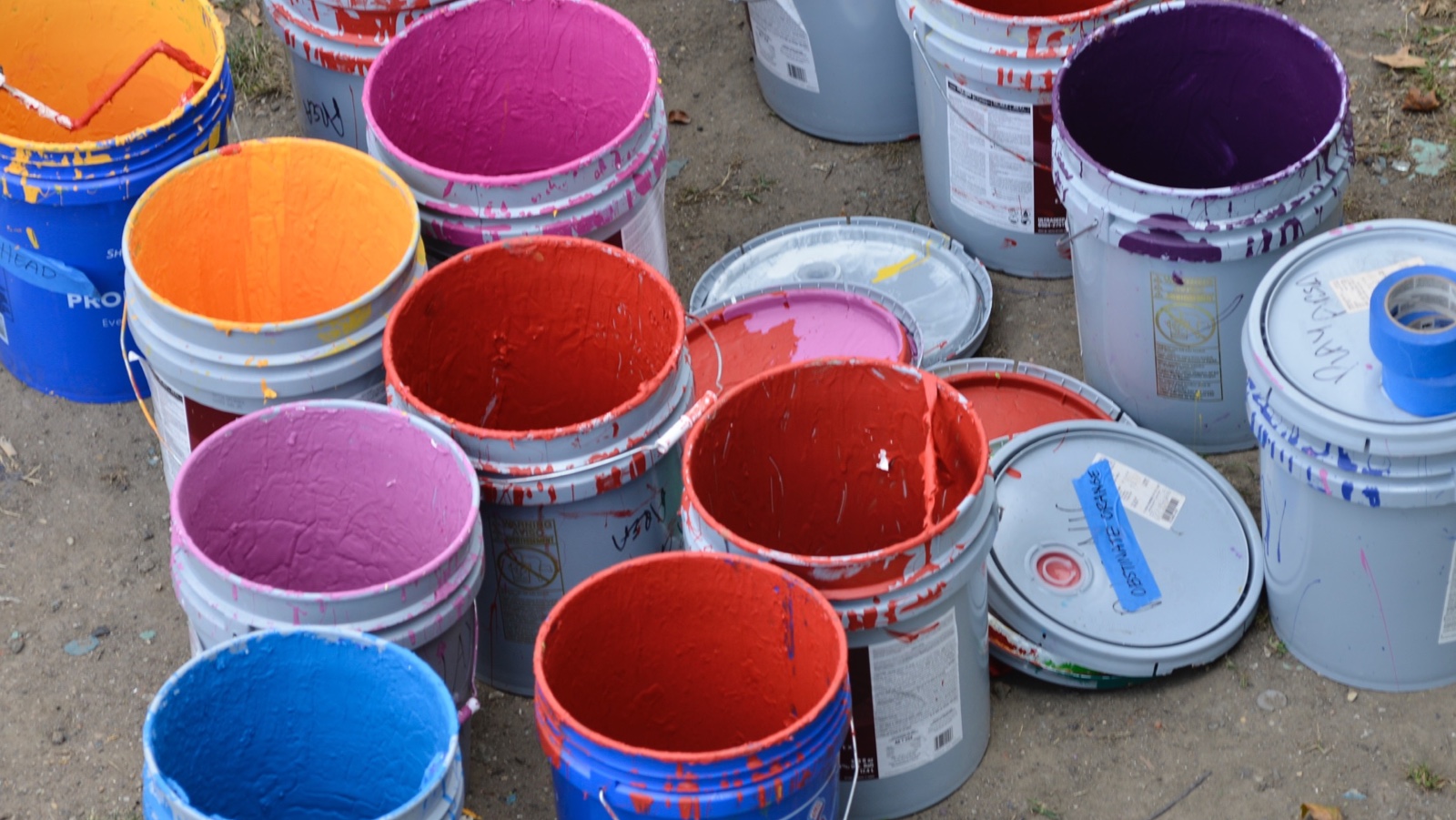 Buckets of paint used for  painting 'Rhythm & Hues' at Eakins Oval. (Bastiaan Slabbers for NewsWorks)