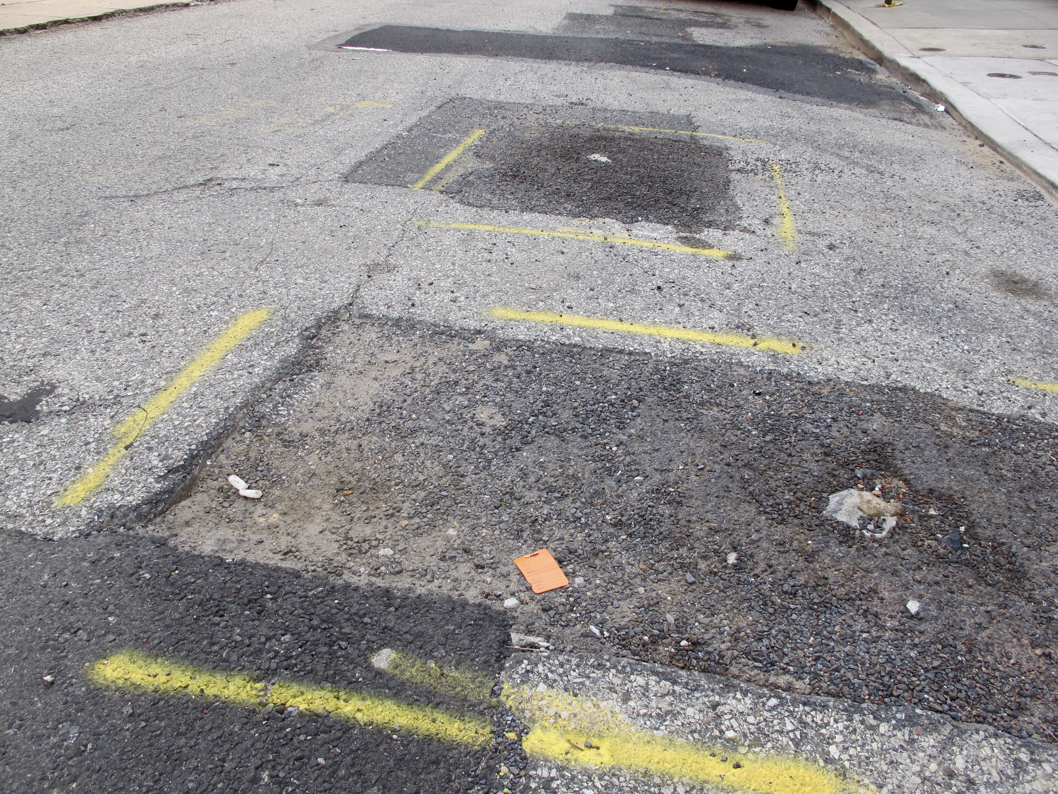 Ditches are not potholes according to the Streets Department's categorization of road defects.
