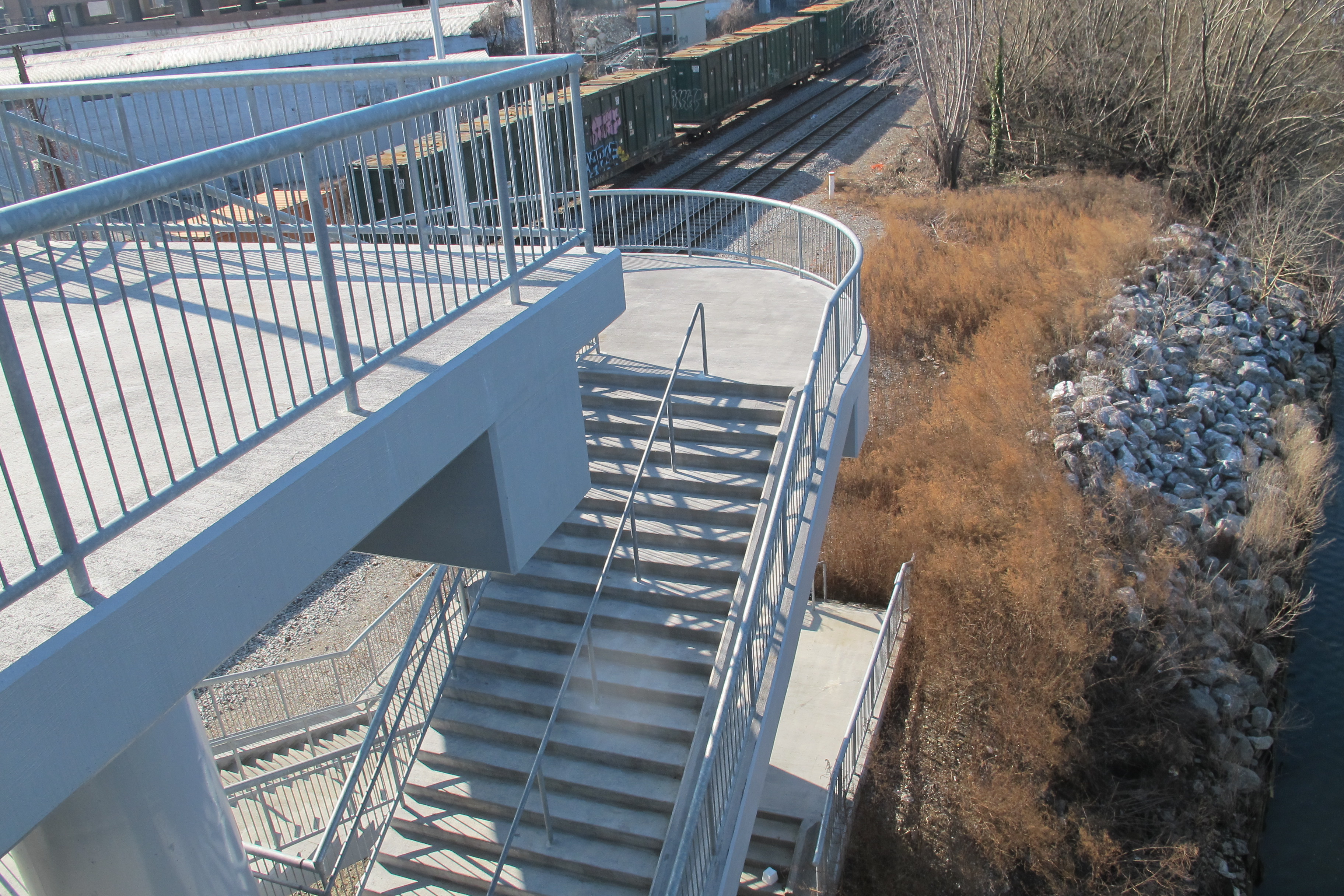 Some day these stairs from the South Street Bridge will connect to a new trail segment extending southward to Christian Street.