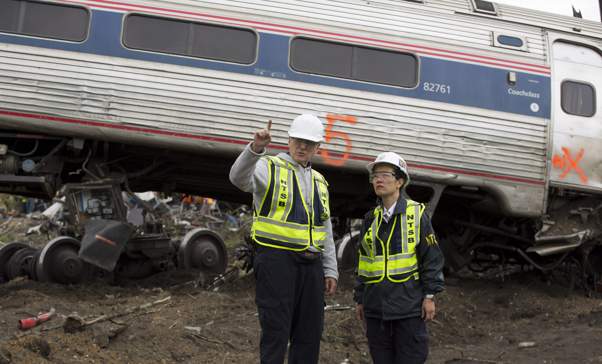 NTSB IIC Mike Flanigon briefs Vice Chairman Dinh-Zarr on the scene of the Amtrak Train #188 Derailment in Philadelphia, PA | NTSB, Creative Commons