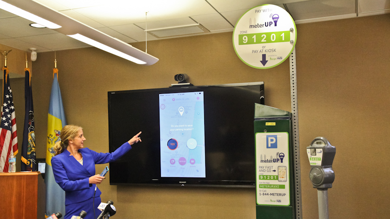 PPA project manager Sue Cornell explains meterUP app at a press conference