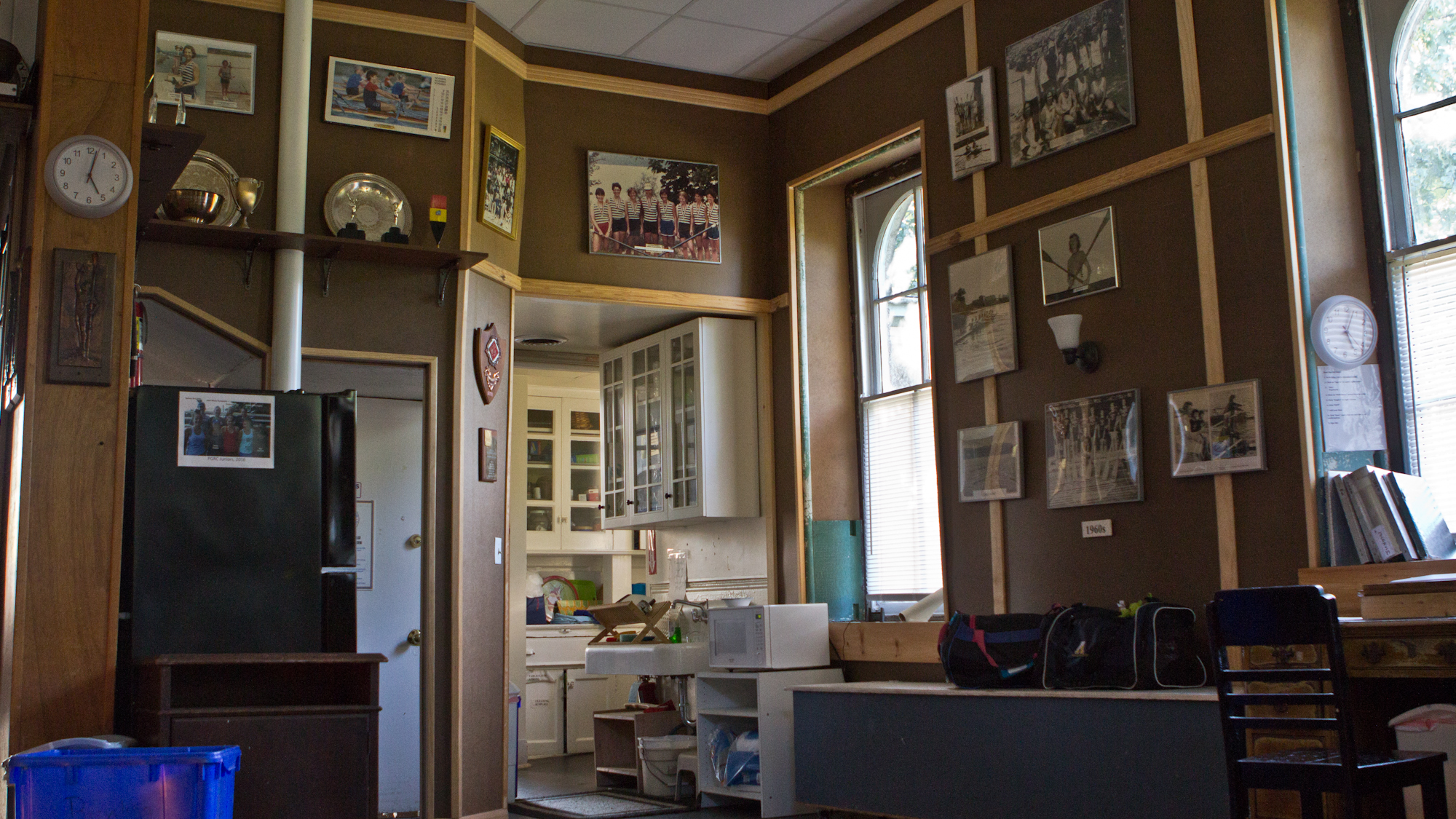 The Philadelphia Girls' Rowing Club’s interior is filled with old photographs of members and memorabilia. (Kimberly Paynter/WHYY)