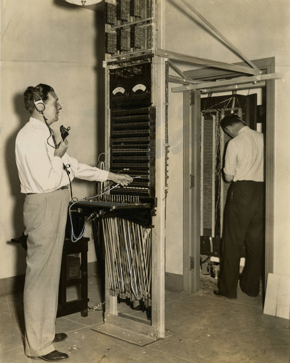 Installing a transformer board inside the Convention Hall for press workrooms to communicate with newspapers during the Democratic convention. | Evening Bulletin | Special Collections Research Center, Temple University Libraries, Philadelphia, PA