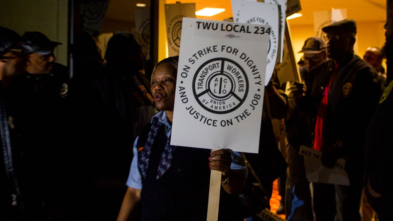 TWU Local 234 workers rallied at their union hall on Oct. 28 and distributed strike signs for the picket lines (Brad Larrison for WHYY)