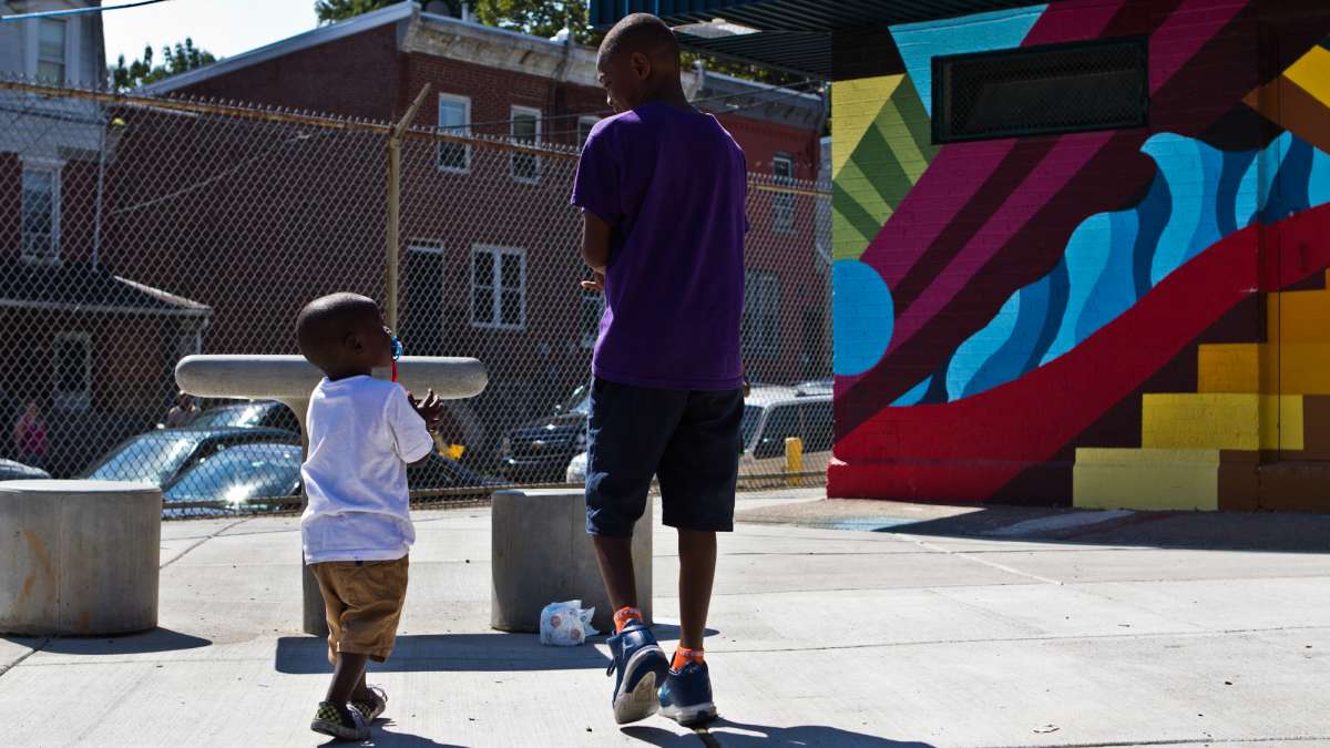 Brothers at Wister Playground | Kimberly Paynter / WHYY