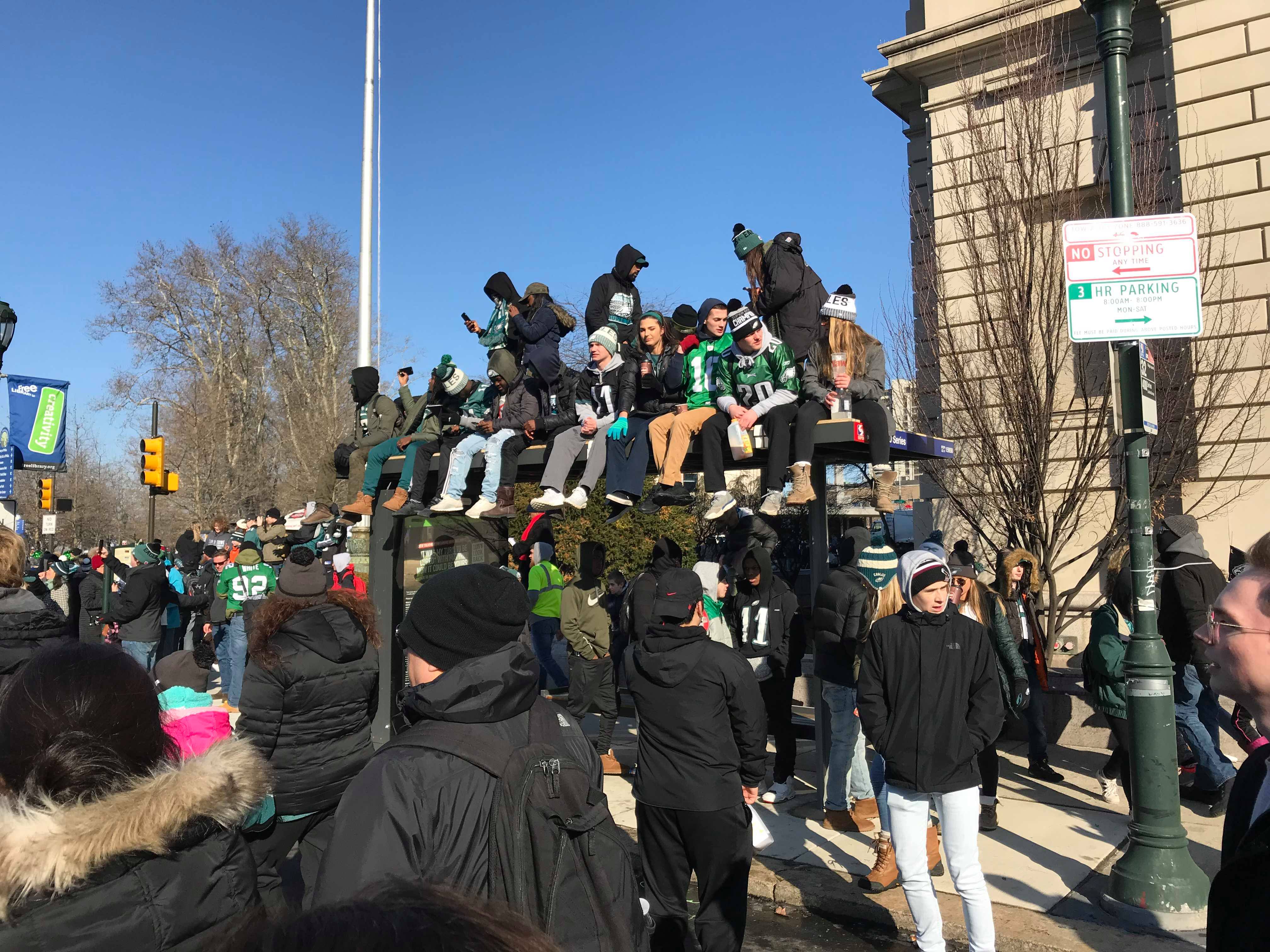 Eagles Fans Sit Atop SEPTA Stop for a Good View. Credit: Tom Gannon/Nick's Roast Beef