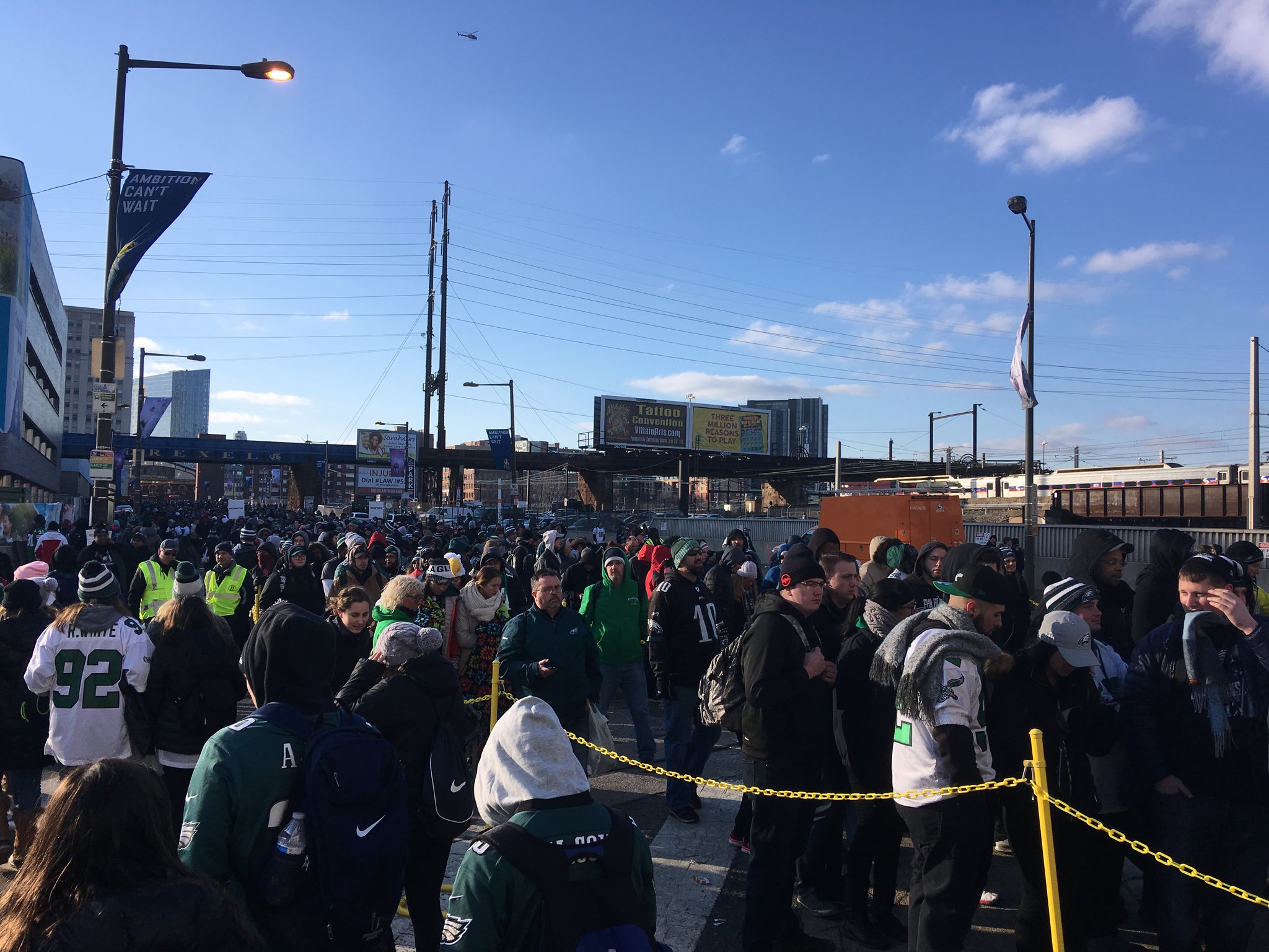 Eagles paradegoers wait in line to get into 30th Street Station. Credit: Jim Saksa/WHYY