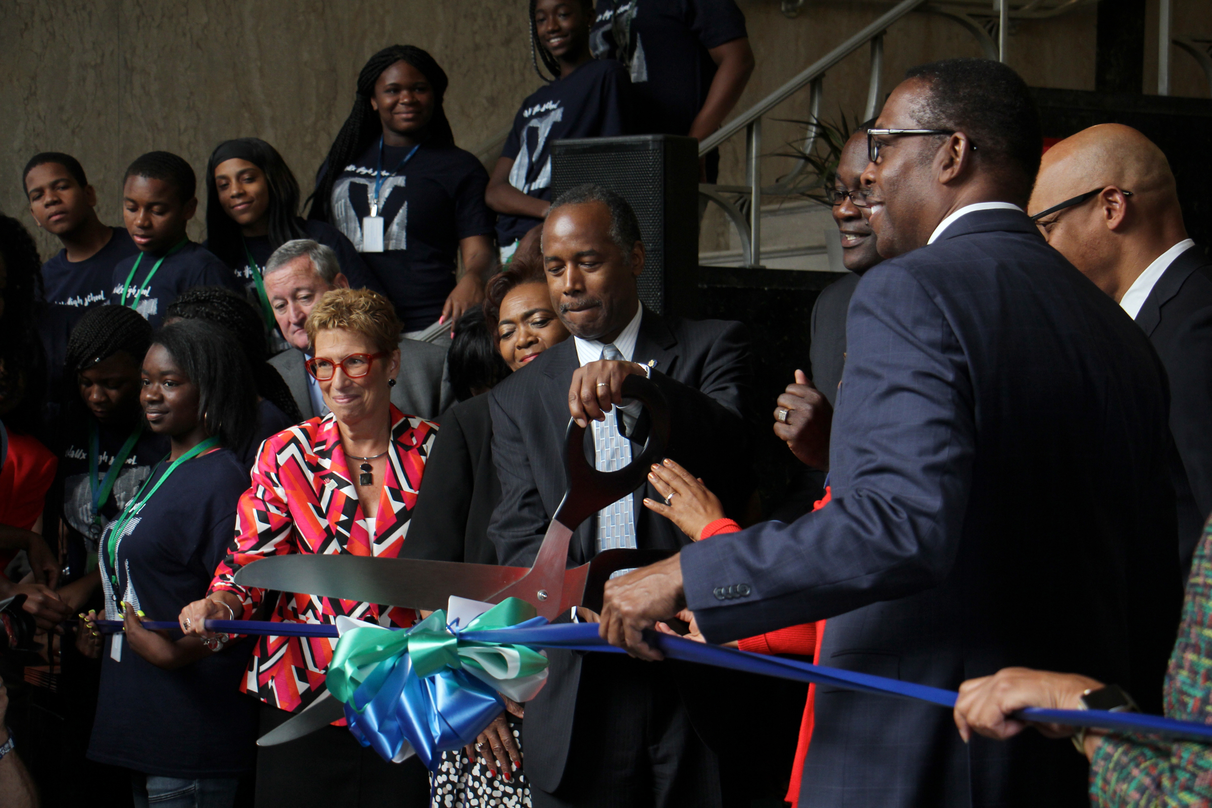 Flanked by Philadelphia officials, HUD Sec. Carson cuts ribbon at opening of Vaux Big Picture High School in Sharswood