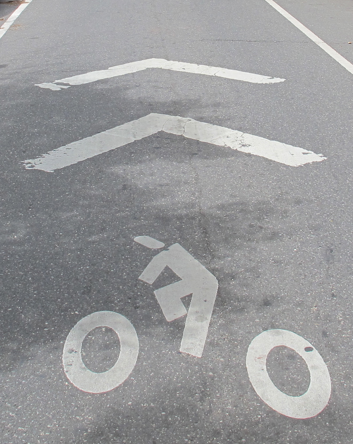 Sharrows are symbols that remind drivers and cyclists to share the lane.