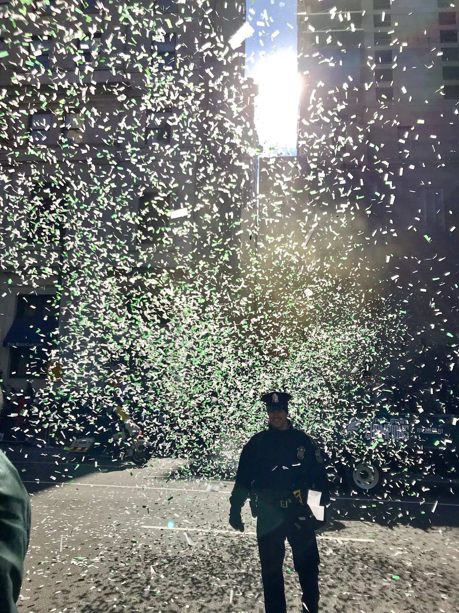 Philadelphia Police officer shrouded in Eagles glitter. Credit: Kim Jordan