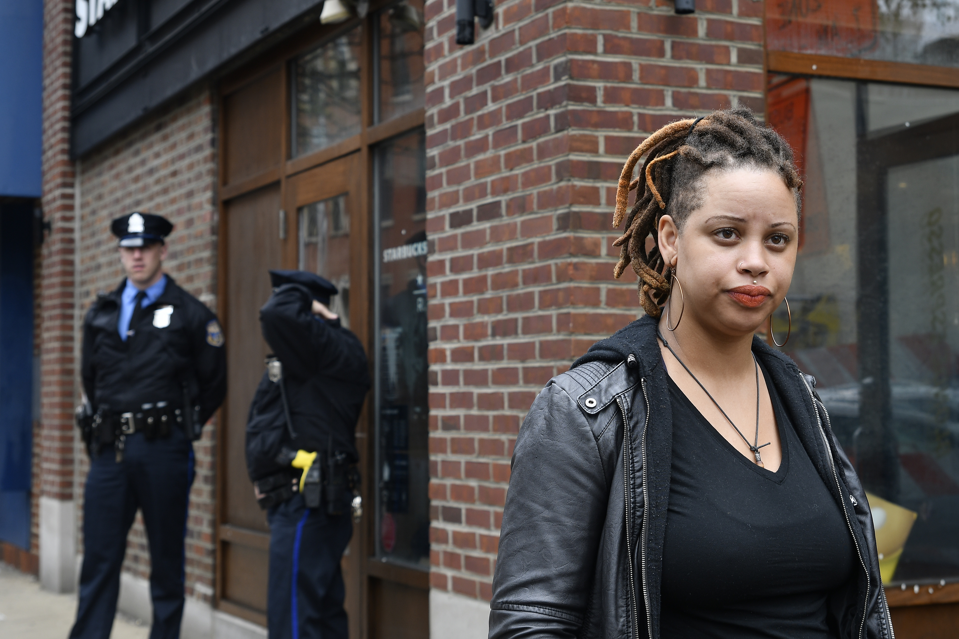 Shani Akilah Robin was one of an estimated 50 people protesting the controversial arrest of two black Starbucks patrons at the chain's Rittenhouse location on April 16. (Bastiaan Slabbers/For WHYY)