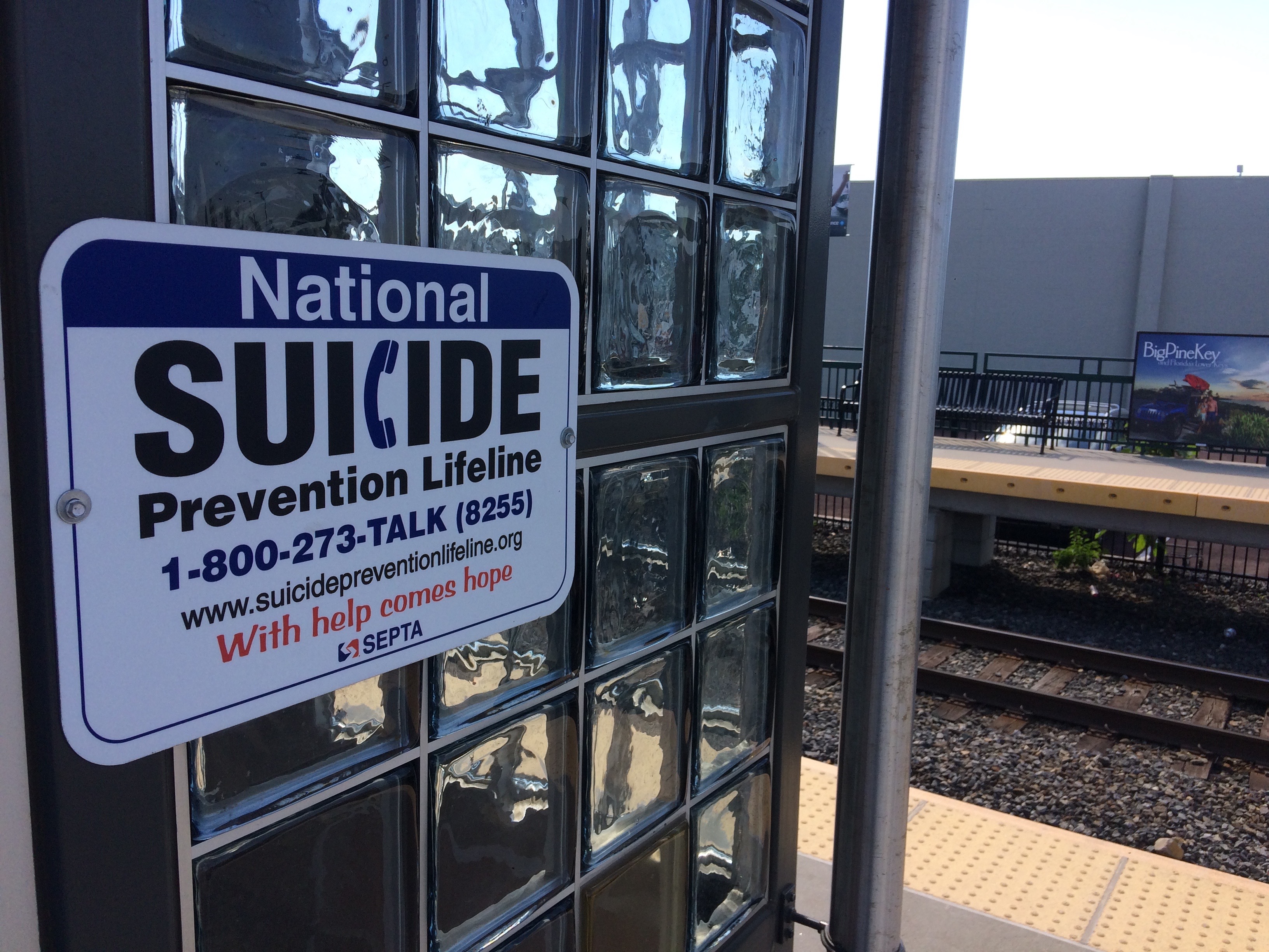 Sign for National Suicide Prevention Lifeline at Primos Station