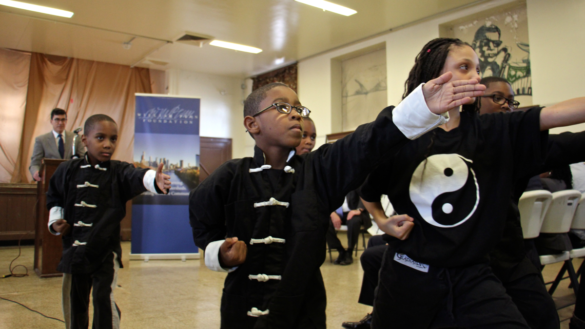 Students at Cecil B. Moore Rec Center during the announcement of a $100 million grant from the William Penn Foundation to improve civic spaces in Philadelphia, November 2016 (Emma Lee/WHYY)