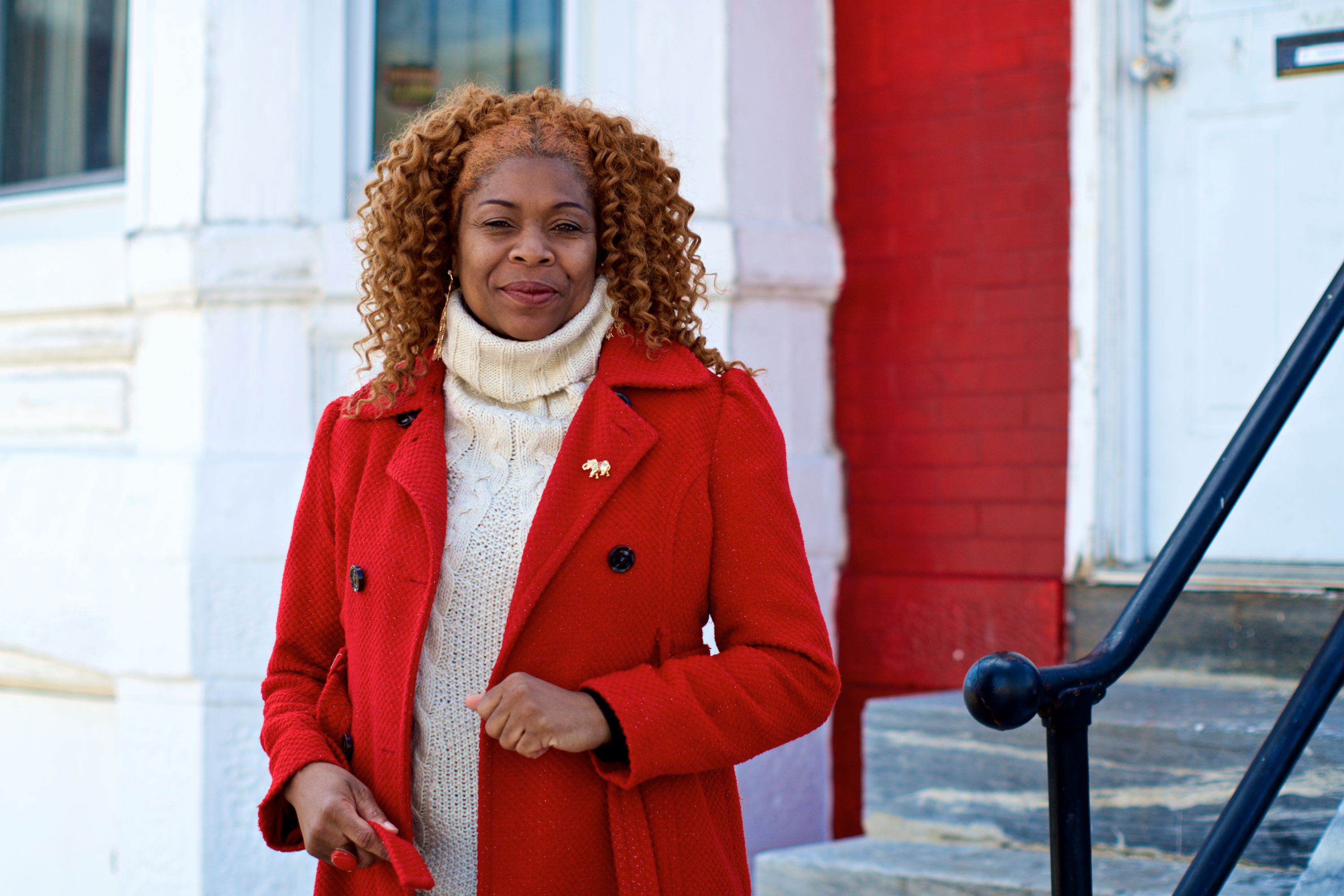 Tonetta Graham in front of her Strawberry Mansion home.