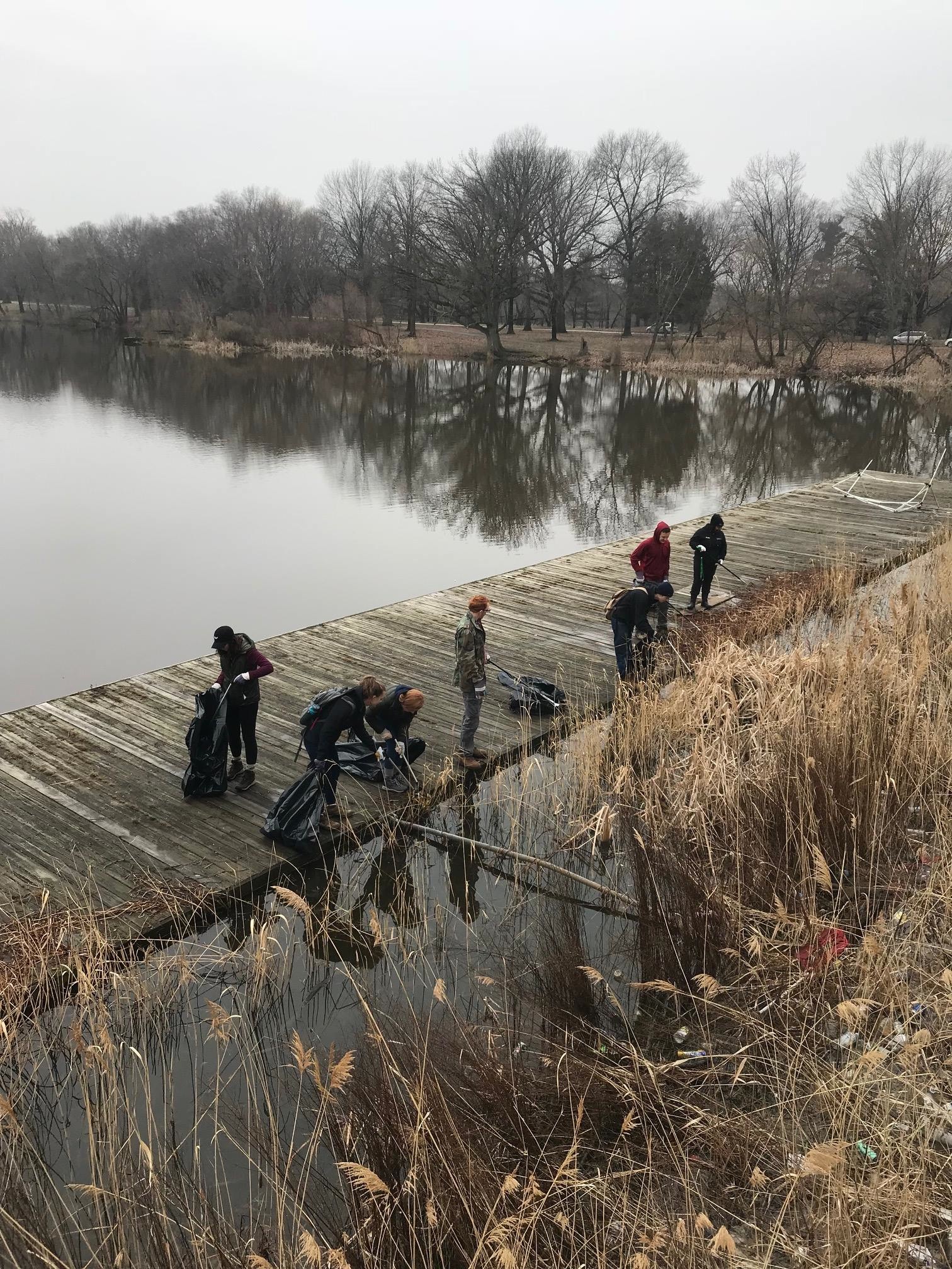 Volunteers clean up one of the lakes at FDR Park on a cold February day. (Photo credit: Friends of FDR Park/Facebook)