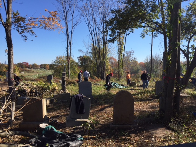 Volunteers clear overgrowth at Mount Moriah.