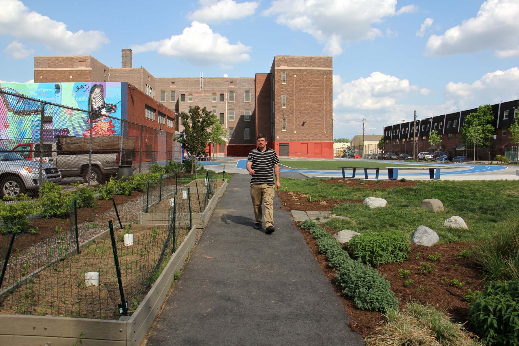 Raised garden beds are used by Taggart School's diverse community to raise food, says Dean of Students David Hensel. (Emma Lee/WHYY)