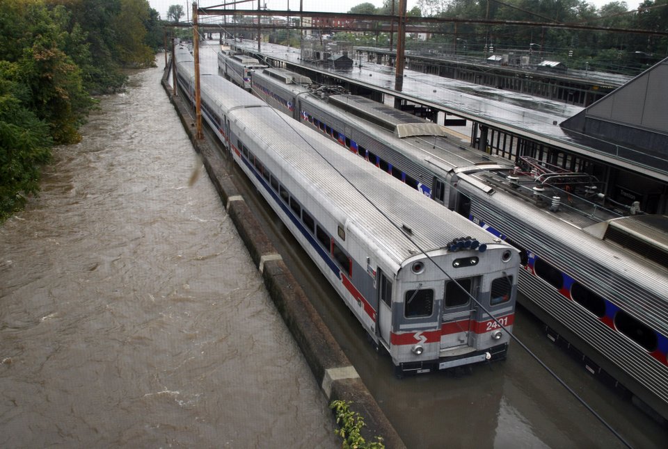 Associated Press Trenton flood puts chokehold on busy Amtrak line