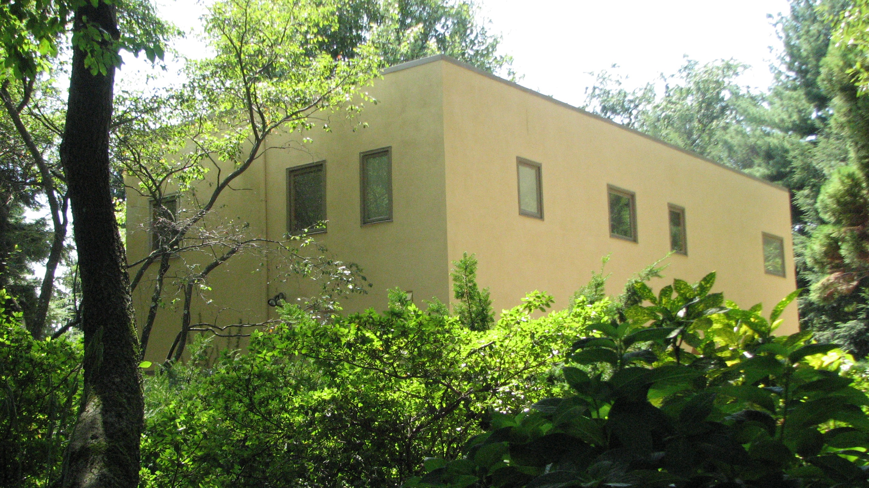 A concrete block home on Cherokee Street is reminiscent of Bauhaus design.