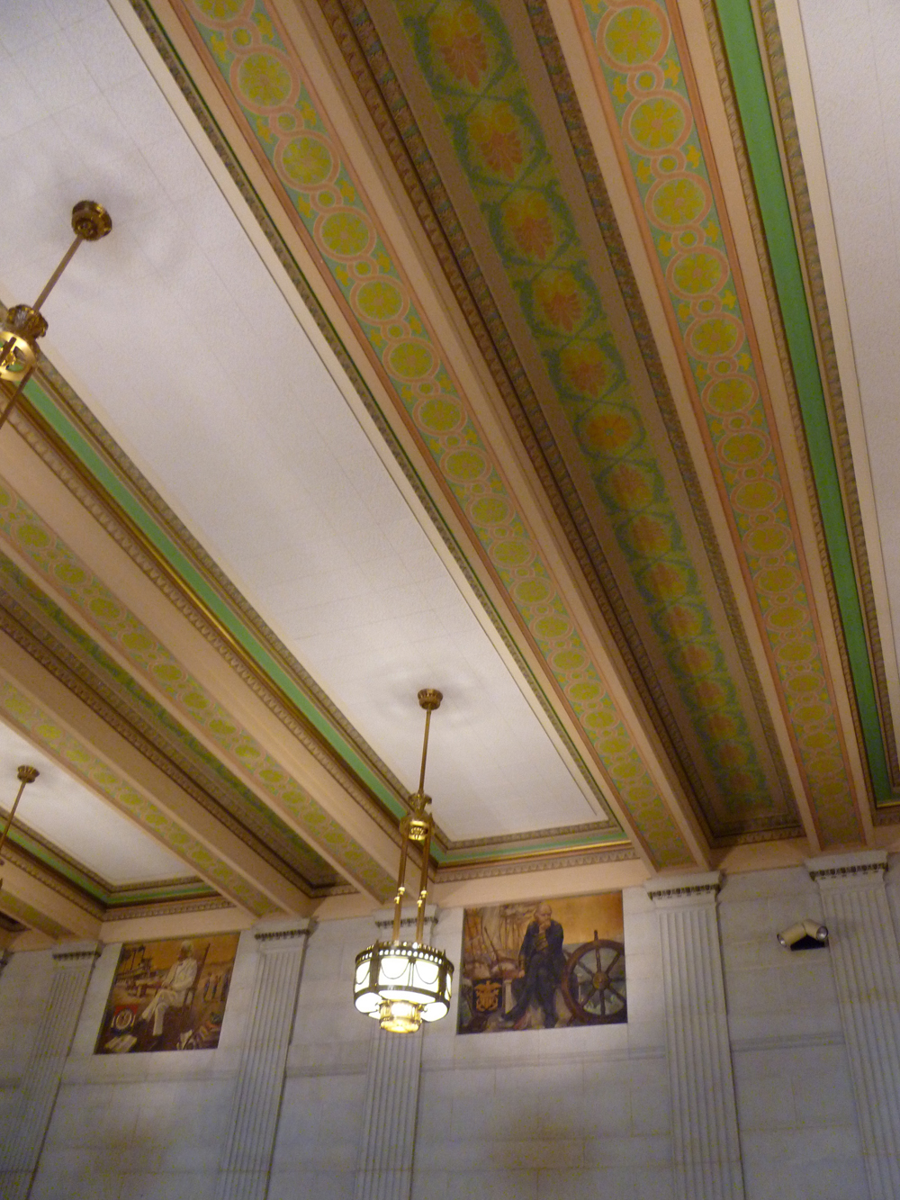 The interior spaces of Family Court include ornate ceiling details, woodwork and light fixtures.