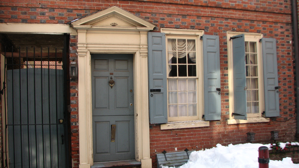 The early 19th century houses on the alley have recessed entrances and windows that provide more privacy.