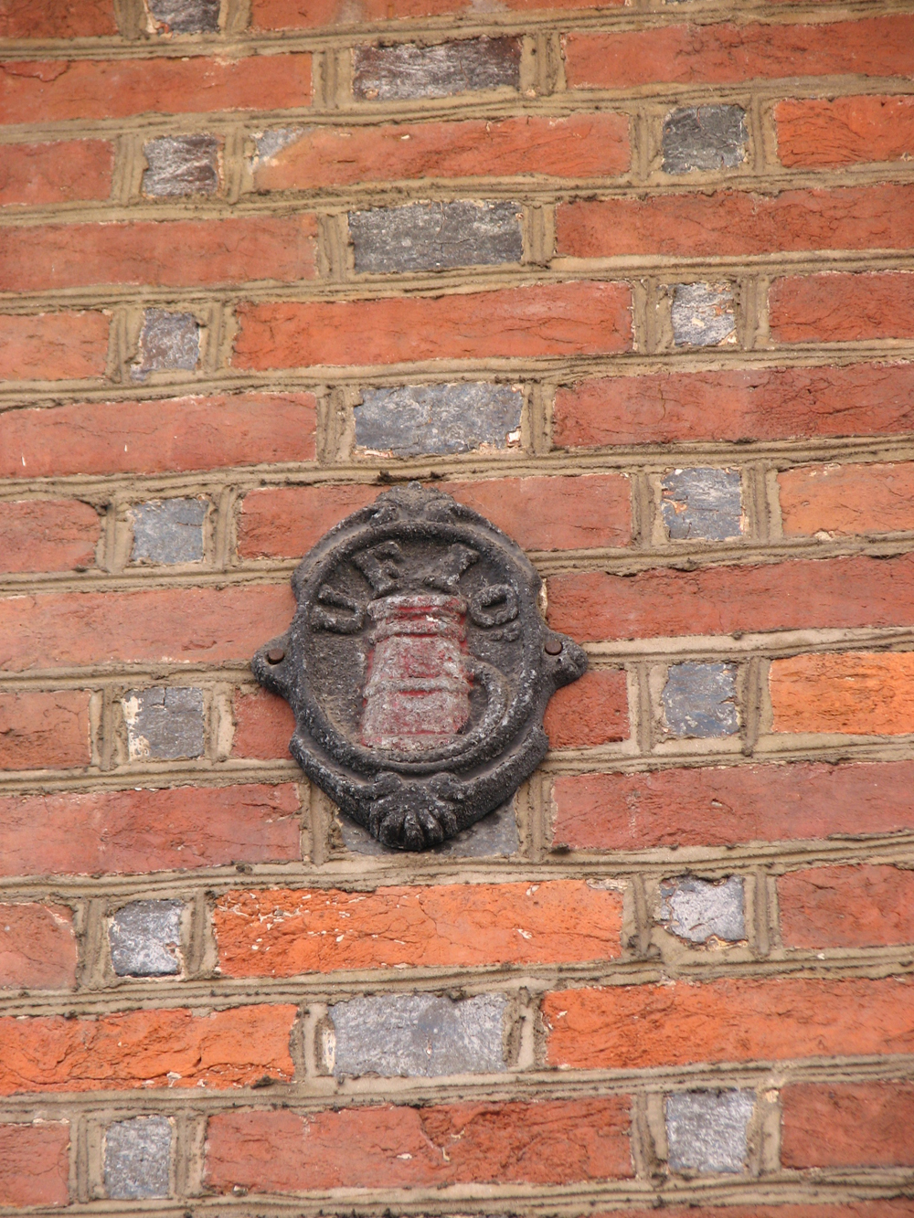 Many of the original fire insurance company plaques can be found on the homes.