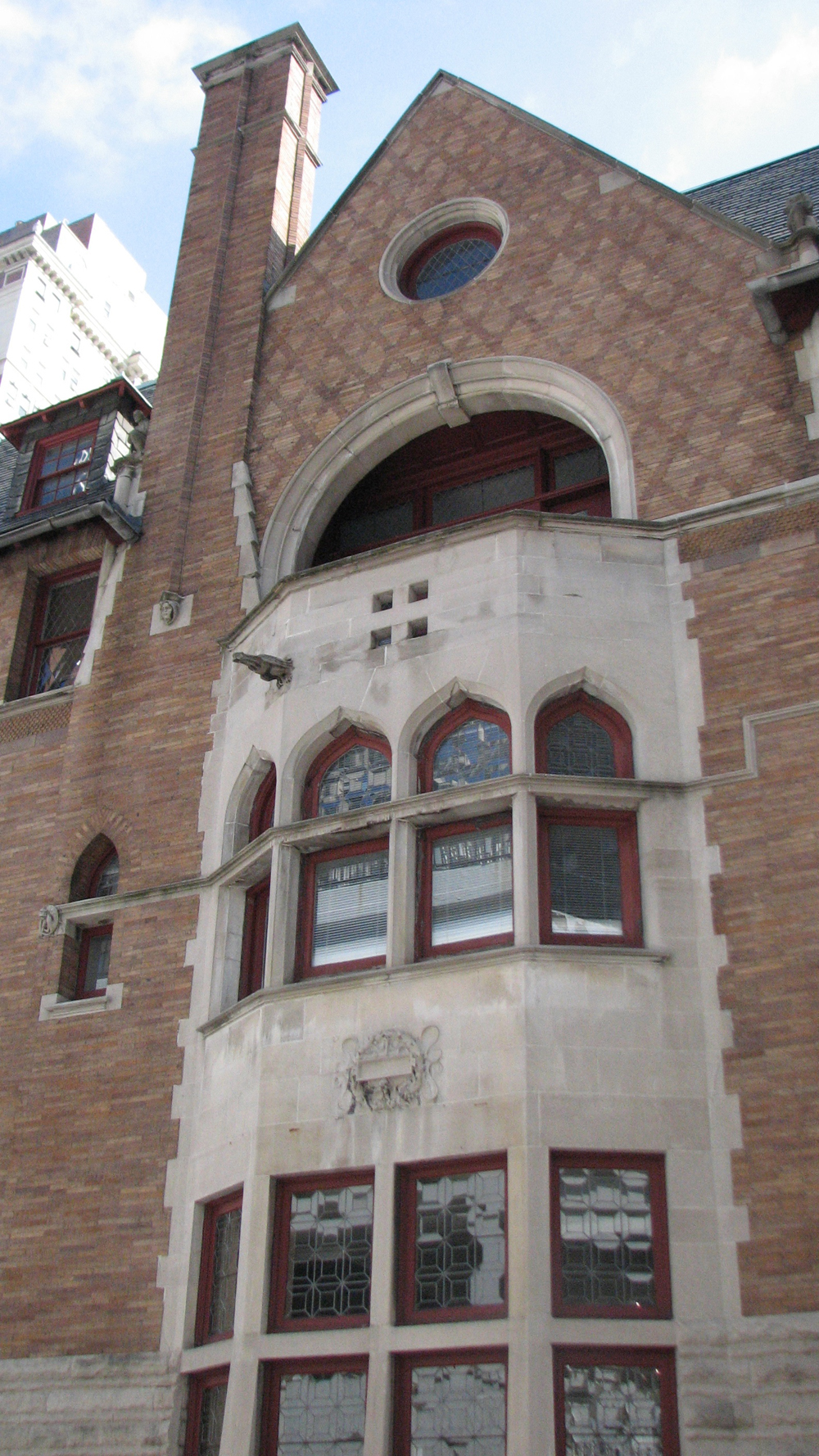 The side of the Moore House features a Venetian-style loggia on the top floor.